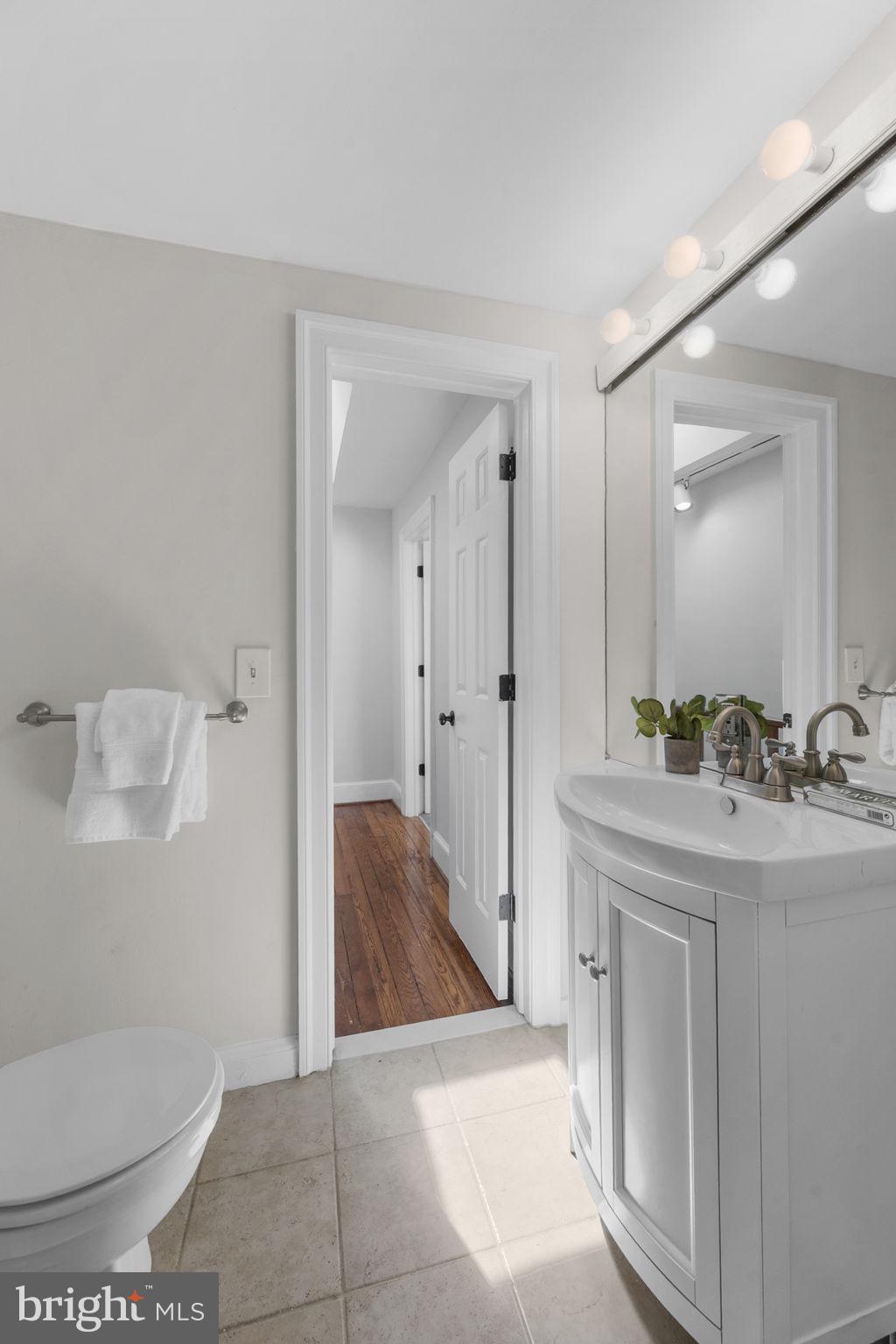 914 15th Street Southeast Washington, DC 20003 - Photo 24 of 37 a bathroom with a sink a toilet and shower