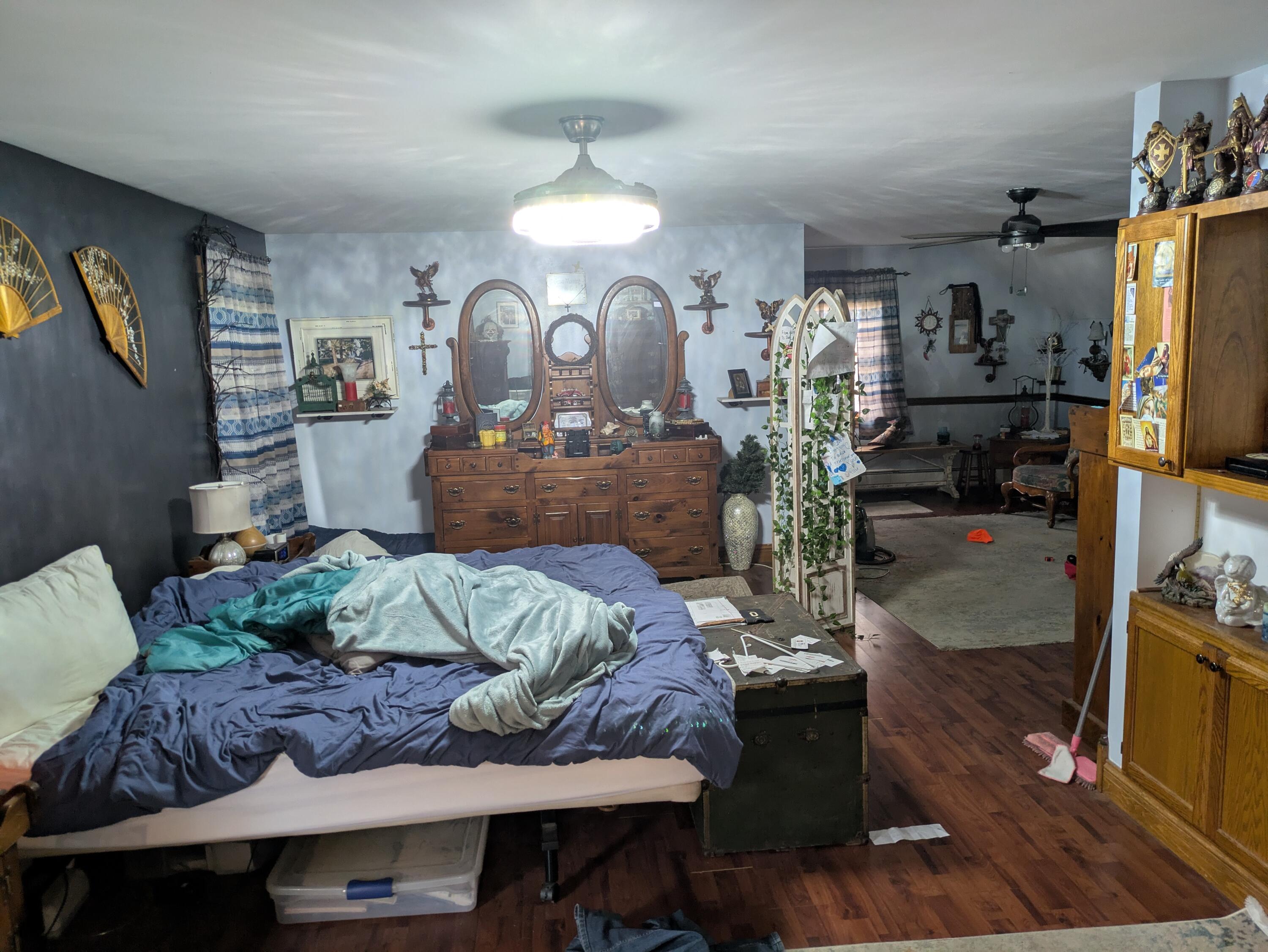 315 North Hobart Road Hobart, IN 46342 - Photo 11 of 33 a living room with furniture flowerpot and a chandelier