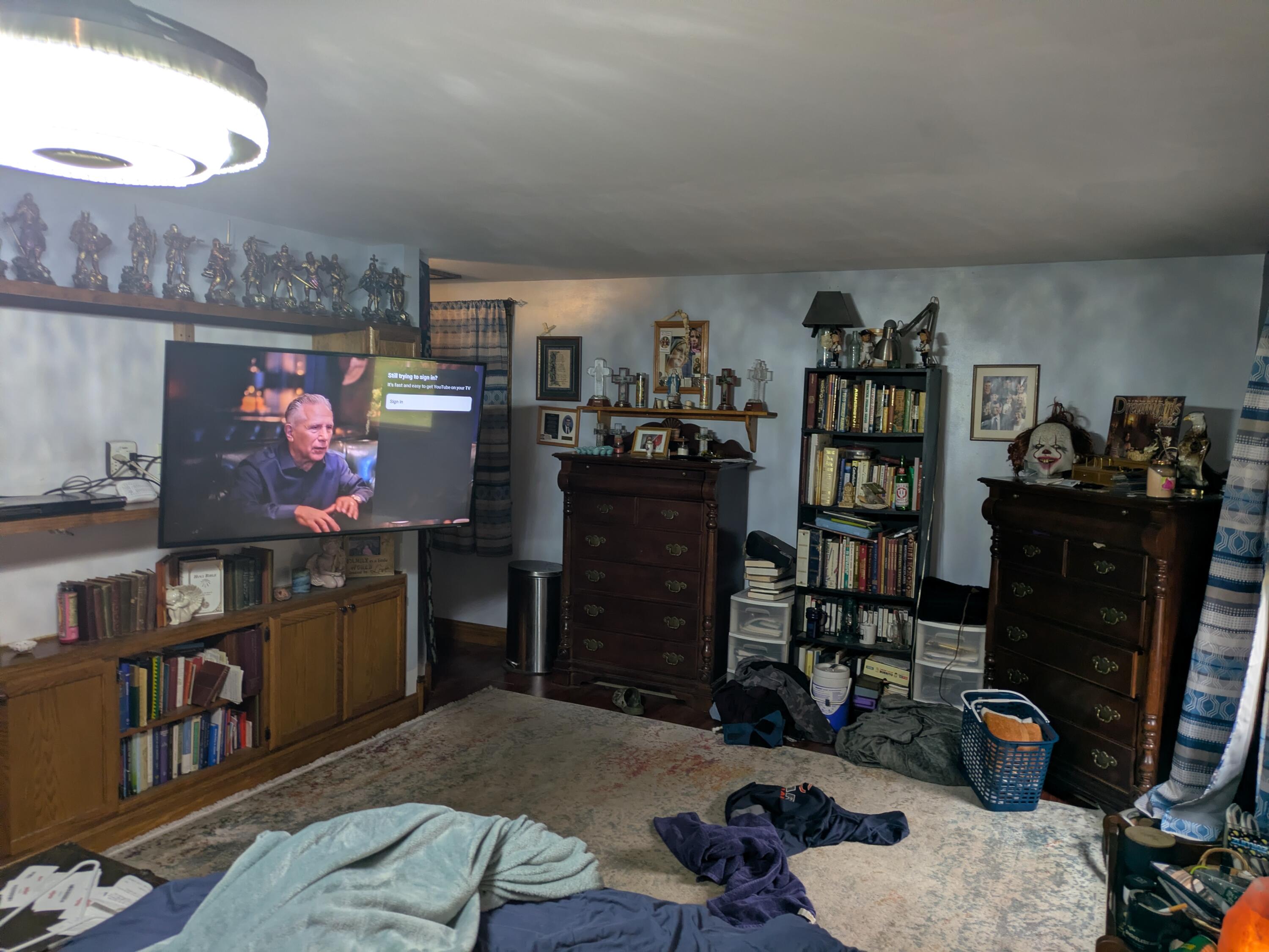 315 North Hobart Road Hobart, IN 46342 - Photo 12 of 33 a room with lots of books and a refrigerator