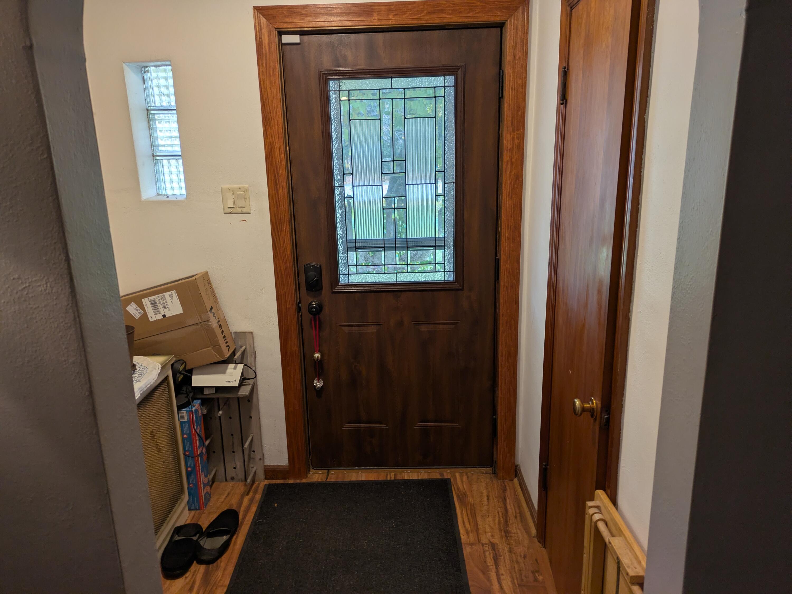 315 North Hobart Road Hobart, IN 46342 - Photo 2 of 33 a view of hallway with stairs and a closet