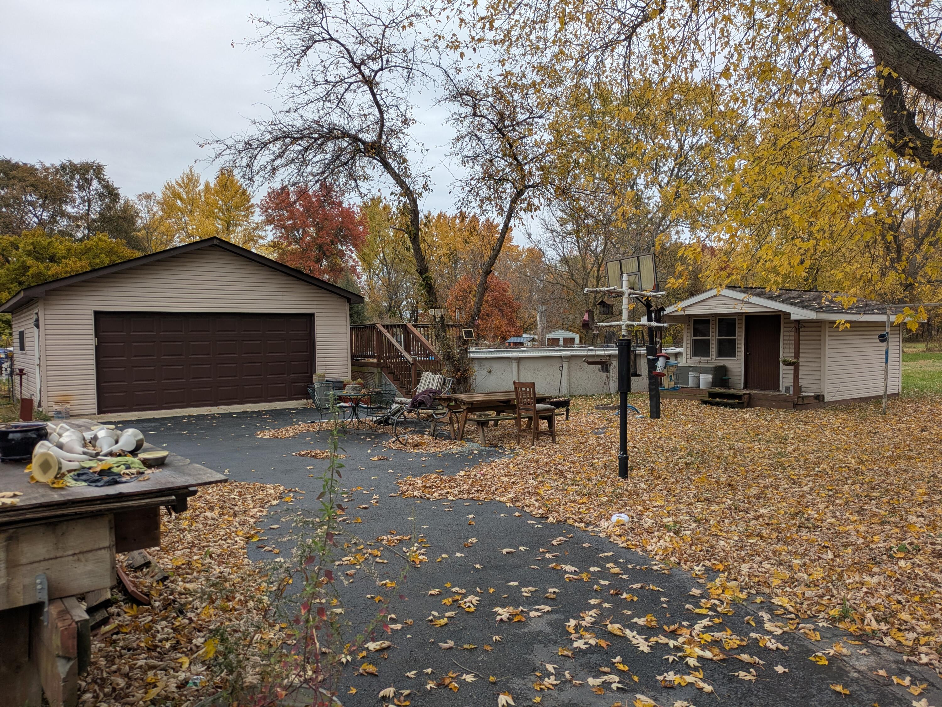 315 North Hobart Road Hobart, IN 46342 - Photo 29 of 33 a backyard of a house with table and chairs