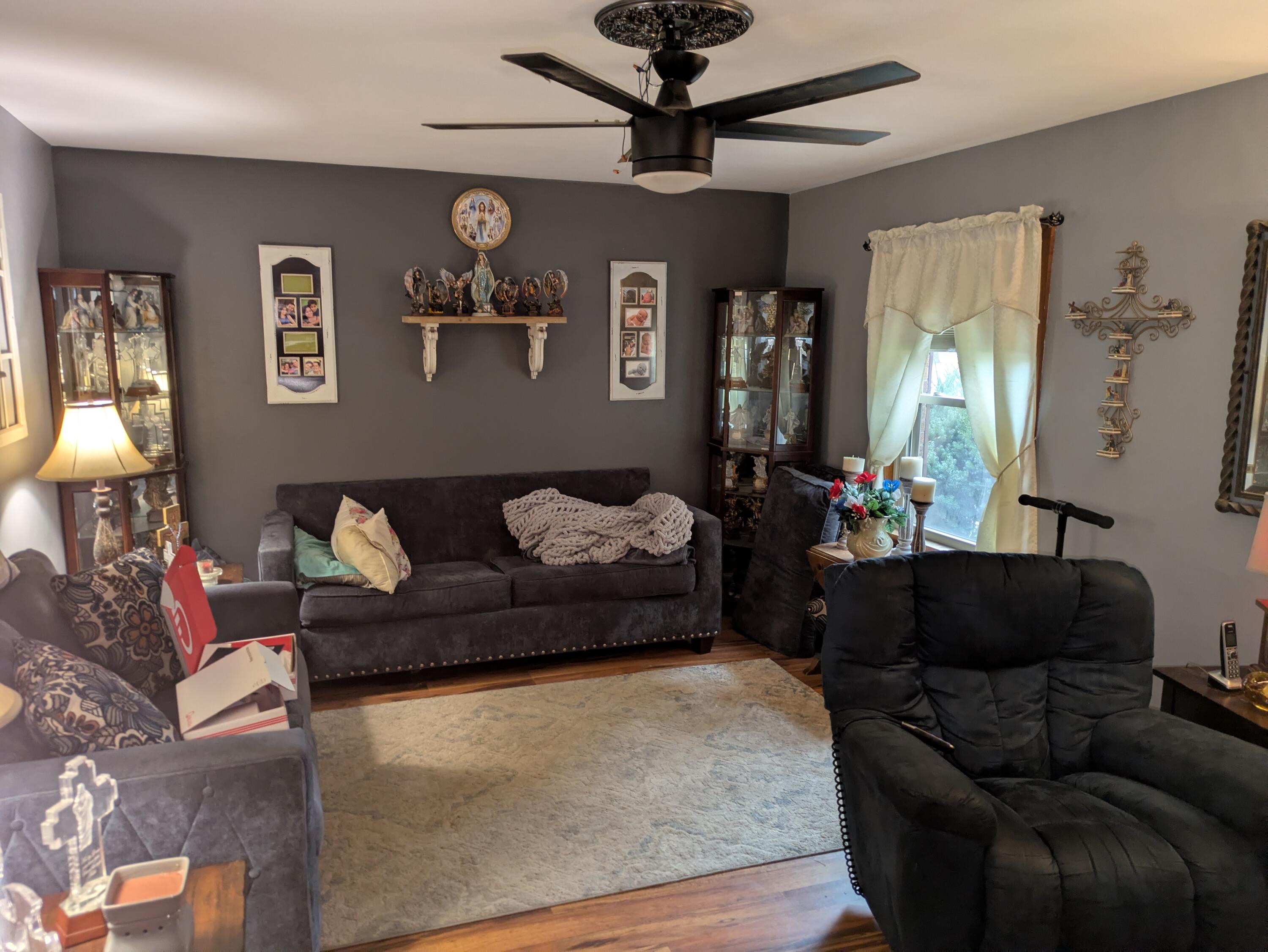 315 North Hobart Road Hobart, IN 46342 - Photo 3 of 33 a living room with furniture and a window