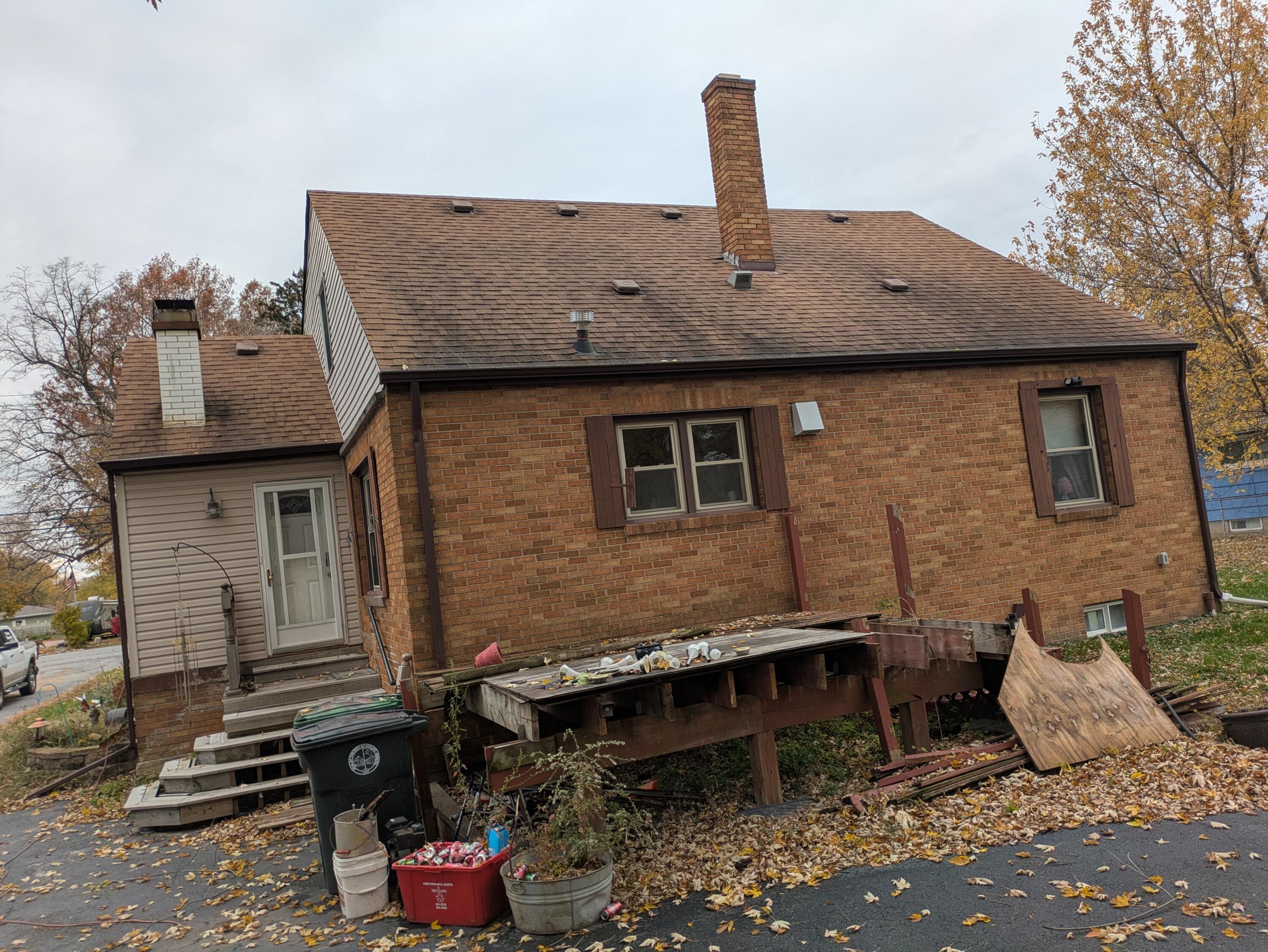 315 North Hobart Road Hobart, IN 46342 - Photo 32 of 33 a backyard of a house with seating space