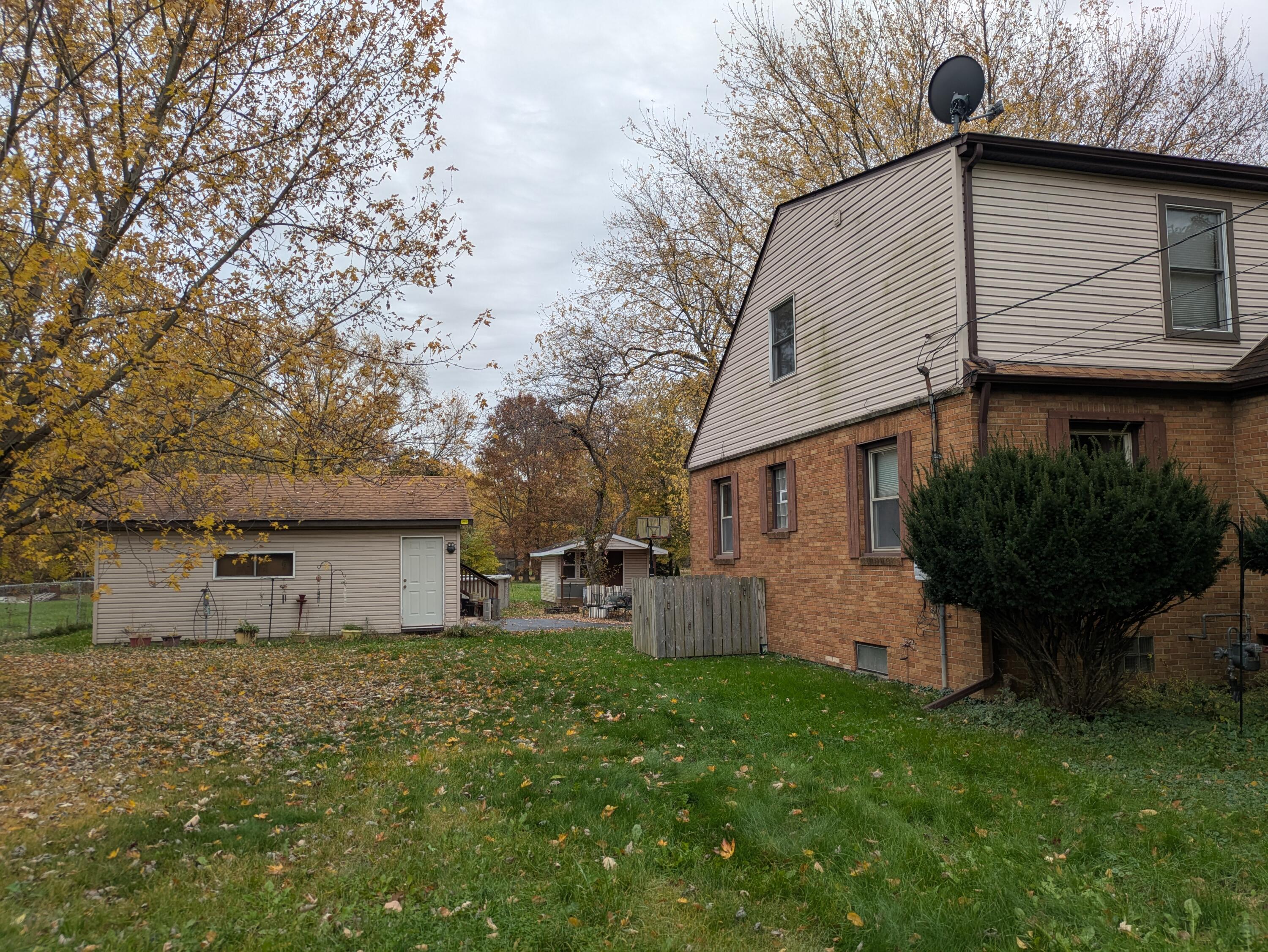 315 North Hobart Road Hobart, IN 46342 - Photo 33 of 33 a front view of house with a garden
