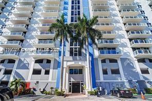 5077 Northwest 7th Street, Unit 1402 Miami, FL 33126 - Photo 1 of 87 a front view of a multi story building