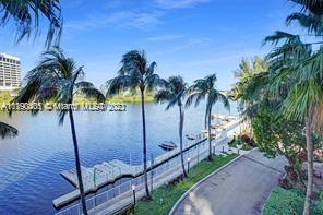 5077 Northwest 7th Street, Unit 1402 Miami, FL 33126 - Photo 15 of 87 a view of outdoor space with palm trees