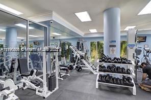 5077 Northwest 7th Street, Unit 1402 Miami, FL 33126 - Photo 25 of 87 a view of a room with gym equipment