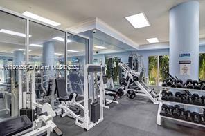 5077 Northwest 7th Street, Unit 1402 Miami, FL 33126 - Photo 26 of 87 a view of a room with gym equipment