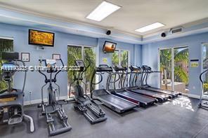 5077 Northwest 7th Street, Unit 1402 Miami, FL 33126 - Photo 27 of 87 a view of a room with gym equipment