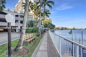 5077 Northwest 7th Street, Unit 1402 Miami, FL 33126 - Photo 31 of 87 a view of a patio in backyard