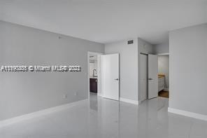 5077 Northwest 7th Street, Unit 1402 Miami, FL 33126 - Photo 57 of 87 a view of a room with an empty space