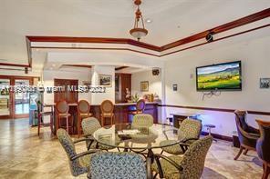 5077 Northwest 7th Street, Unit 1402 Miami, FL 33126 - Photo 7 of 87 a view of a dining room with furniture