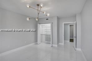 5077 Northwest 7th Street, Unit 1402 Miami, FL 33126 - Photo 72 of 87 a view of a room with an empty space