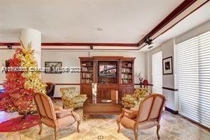 5077 Northwest 7th Street, Unit 1402 Miami, FL 33126 - Photo 9 of 87 a view of a dining room with furniture and window