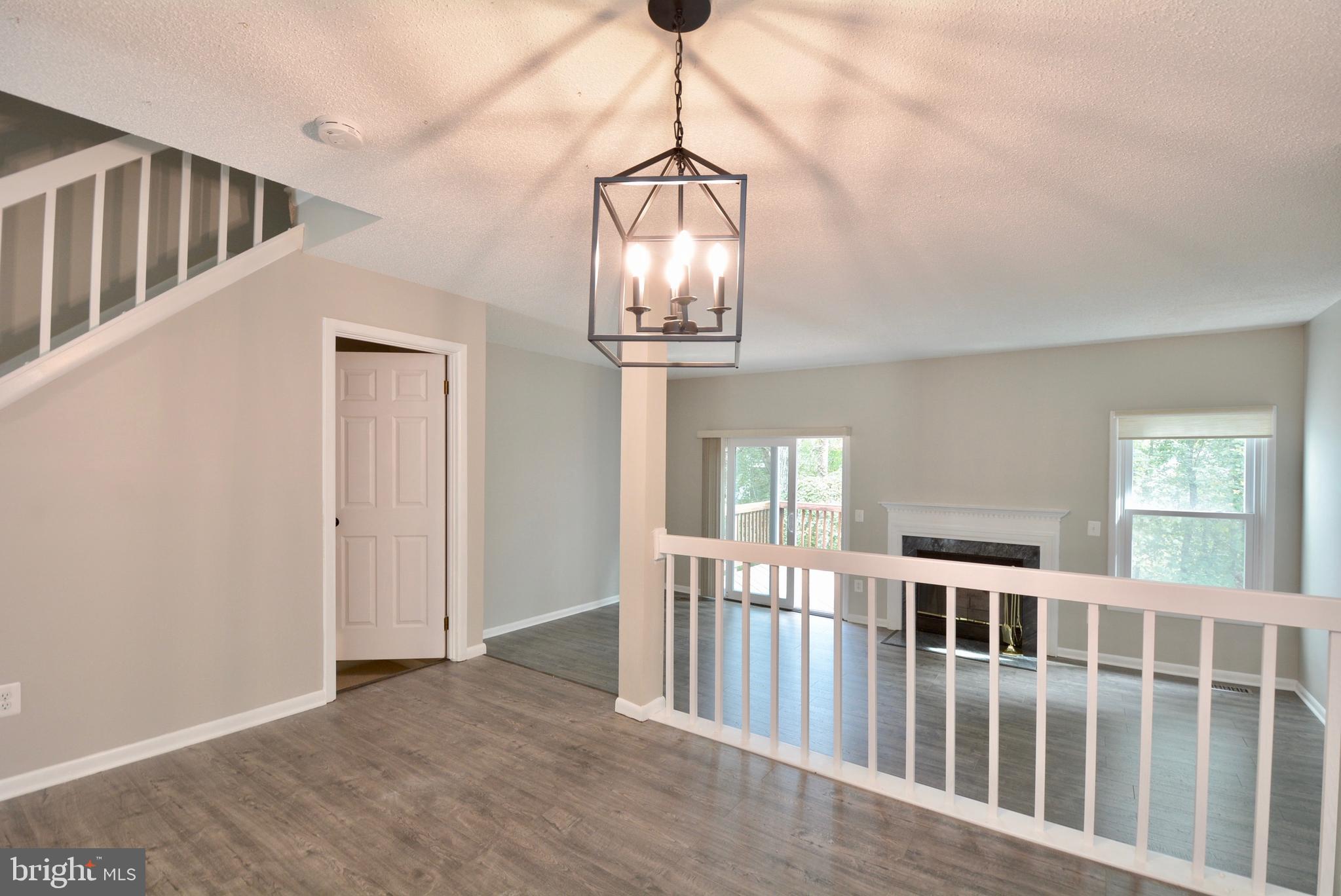 1425 Newport Spring Court Reston, VA 20194 - Photo 9 of 41 Dining room opens to spacious living room