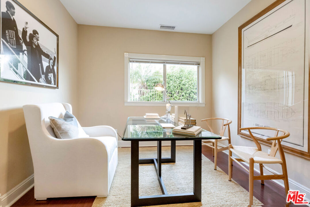7634 Rocky Mountain View Road Tujunga, CA 91042 - Photo 22 of 50 a view of a livingroom with furniture and a window