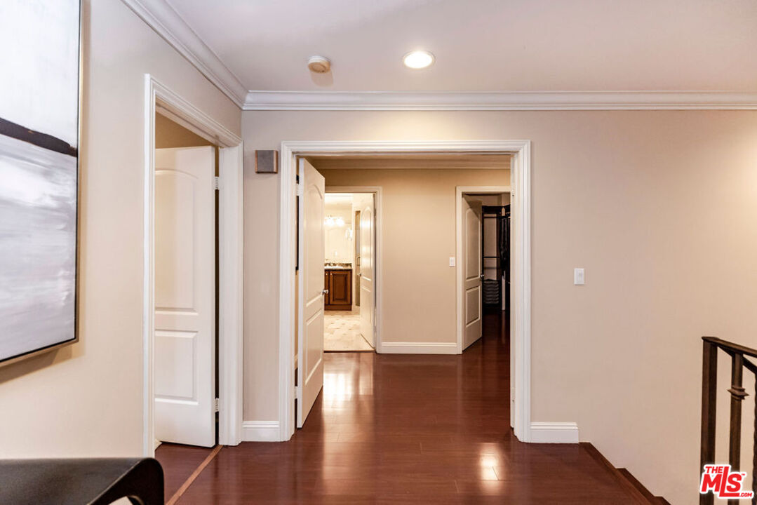 7634 Rocky Mountain View Road Tujunga, CA 91042 - Photo 31 of 50 a view of a hallway with wooden floor