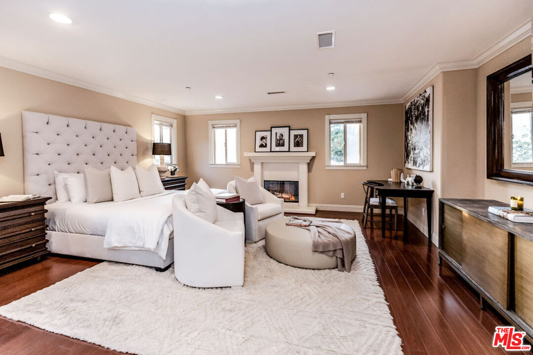 7634 Rocky Mountain View Road Tujunga, CA 91042 - Photo 35 of 50 a living room with furniture and a flat screen tv