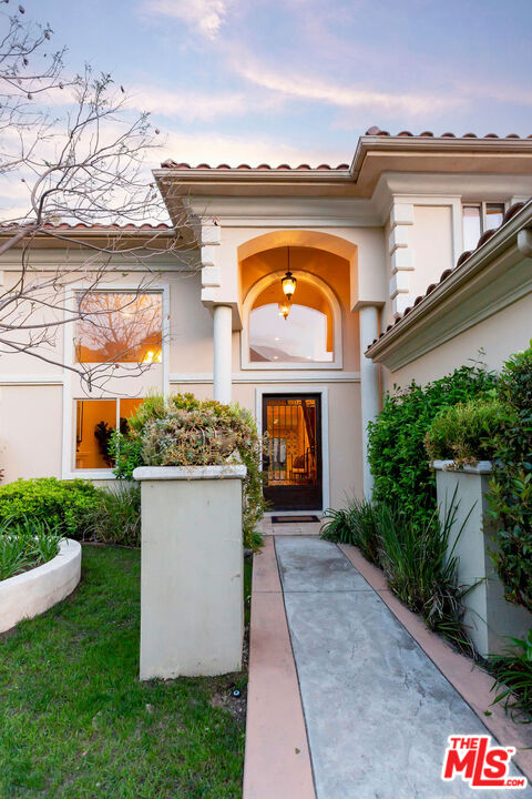 7634 Rocky Mountain View Road Tujunga, CA 91042 - Photo 4 of 50 a front view of a house with a yard