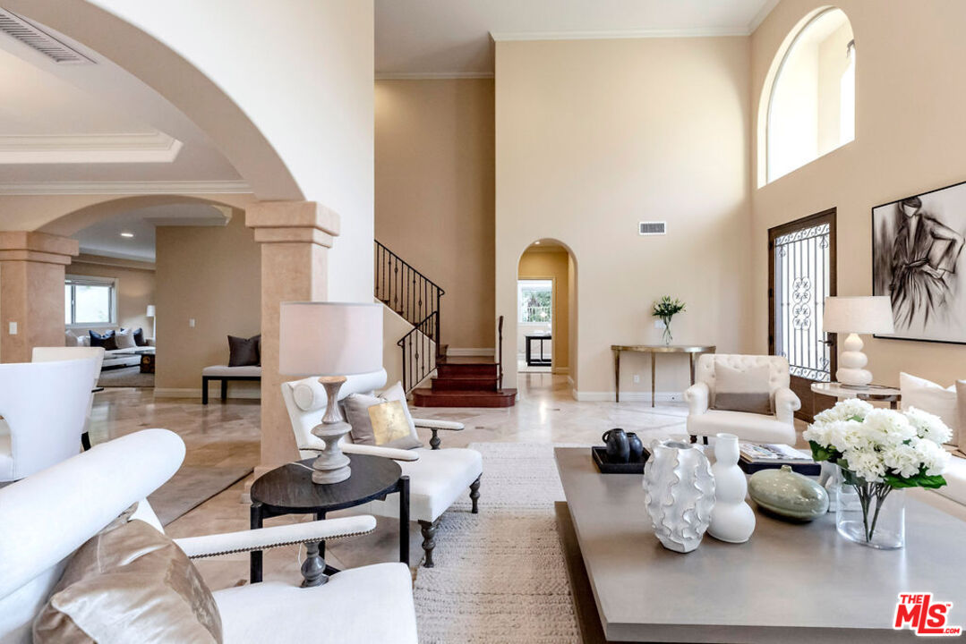 7634 Rocky Mountain View Road Tujunga, CA 91042 - Photo 7 of 50 a living room with furniture and wooden floor