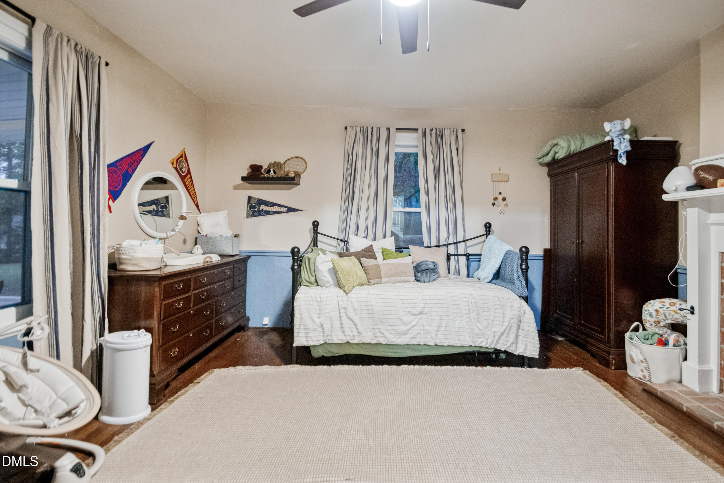 1734 Rocky Ford Road Henderson, NC 27537 - Photo 18 of 44 a bedroom with bed and a dresser