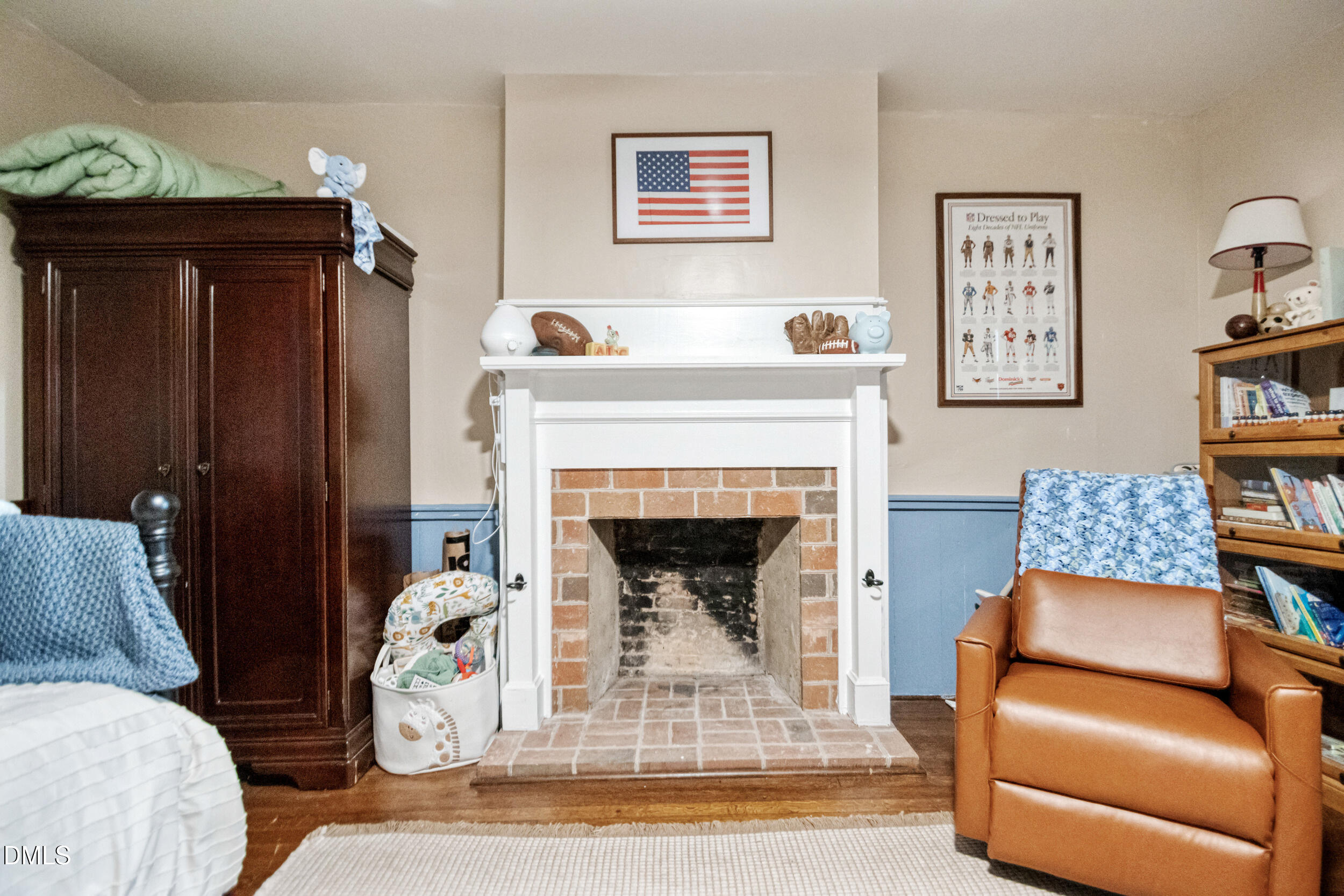 1734 Rocky Ford Road Henderson, NC 27537 - Photo 19 of 44 a living room with furniture and a fireplace