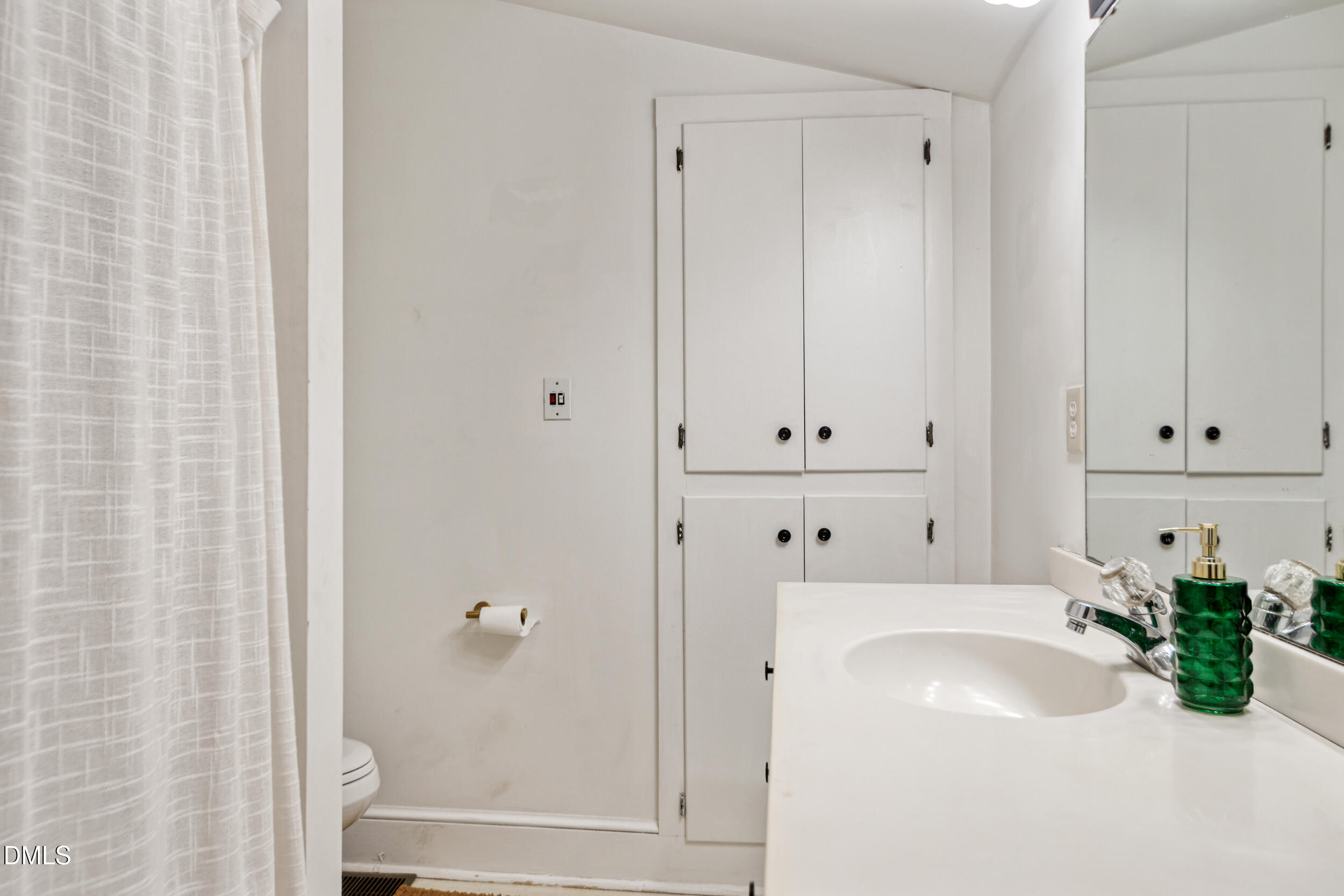 1734 Rocky Ford Road Henderson, NC 27537 - Photo 21 of 44 a bathroom with a sink tub and shower
