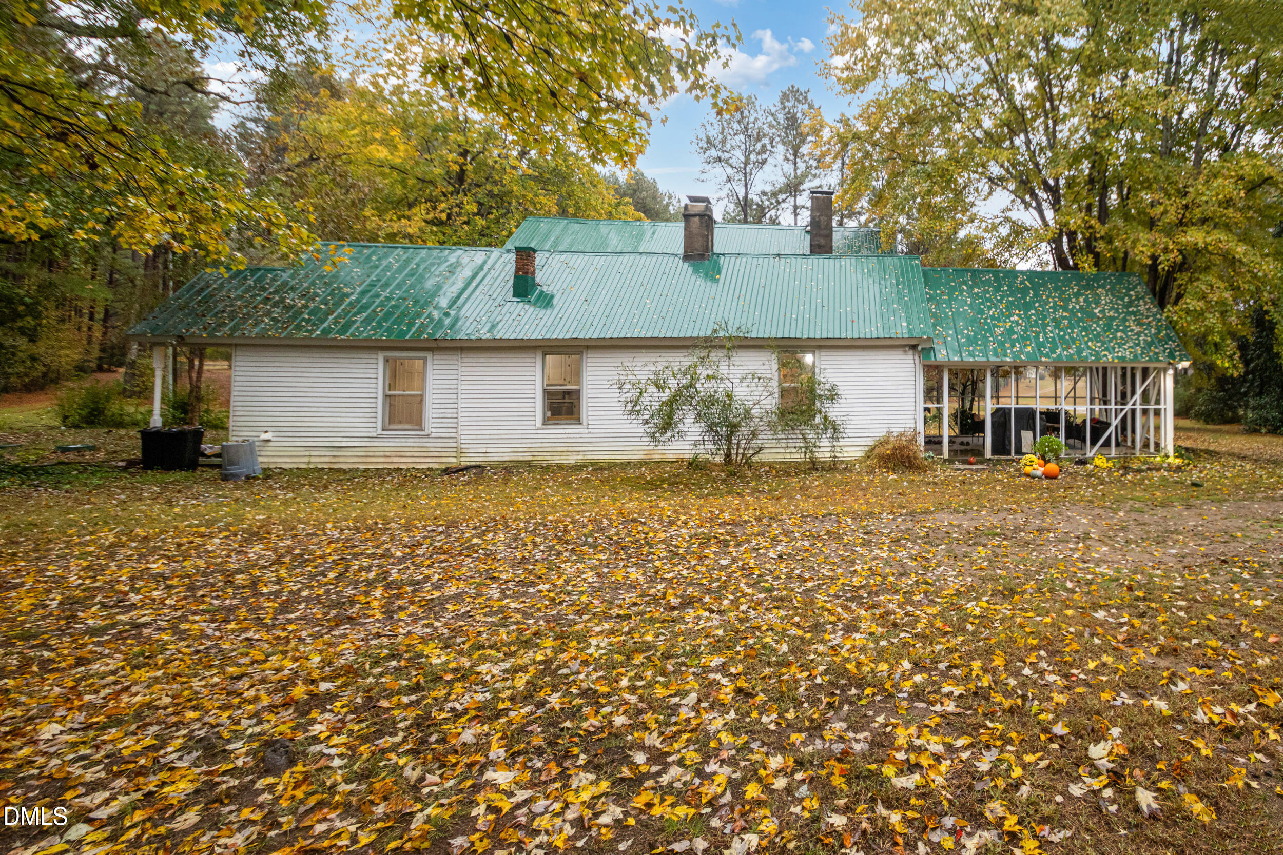 1734 Rocky Ford Road Henderson, NC 27537 - Photo 30 of 44 front view of a house with a yard