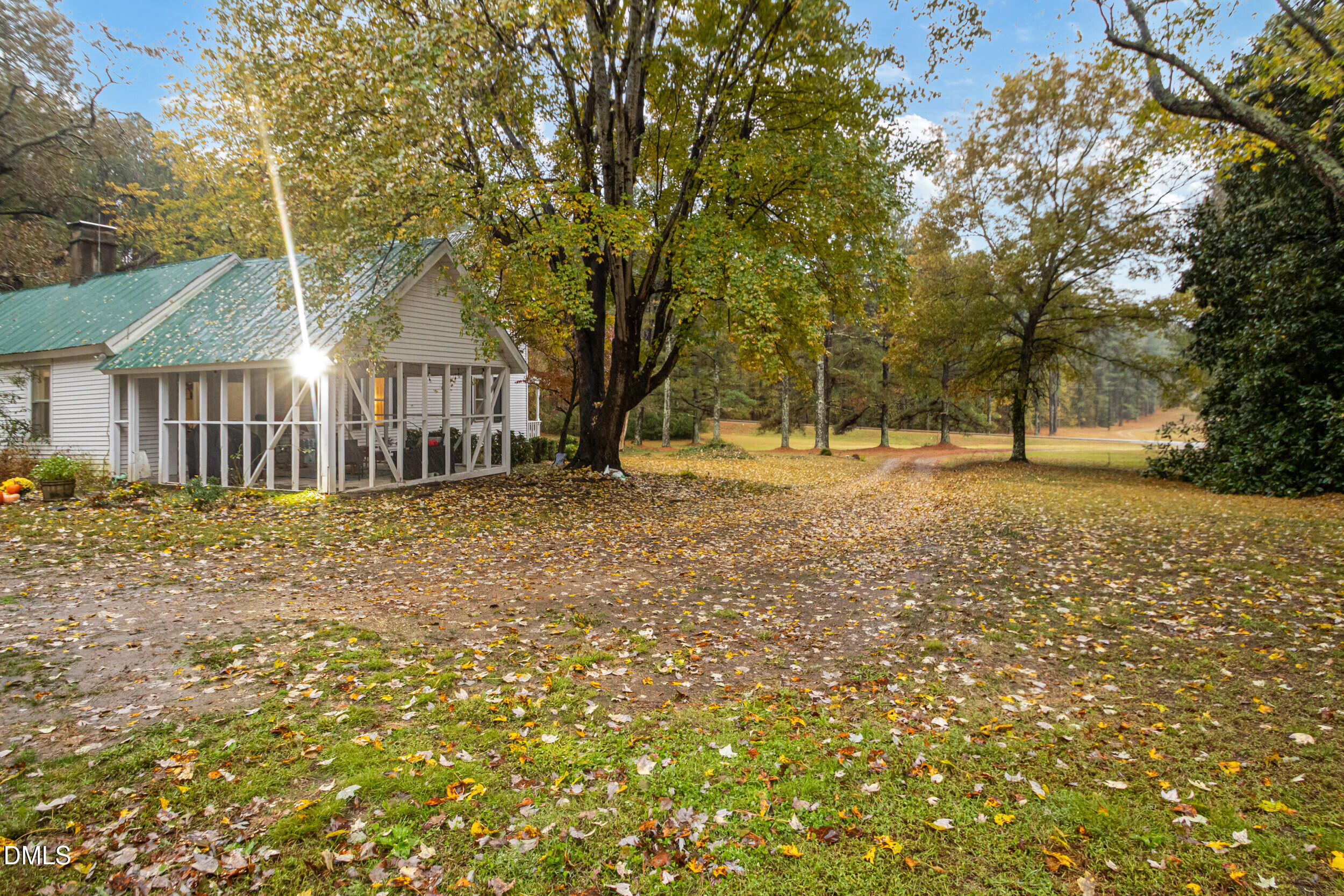 1734 Rocky Ford Road Henderson, NC 27537 - Photo 31 of 44 front view of a house with a yard