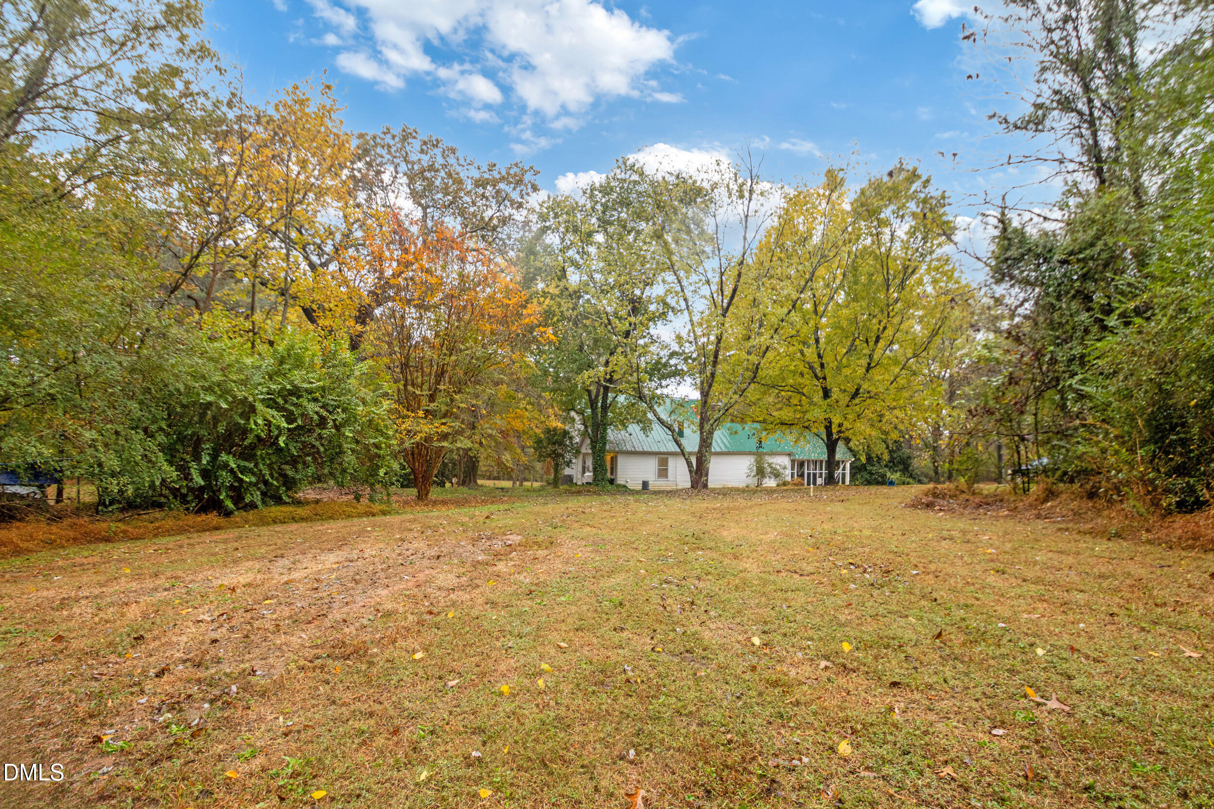 1734 Rocky Ford Road Henderson, NC 27537 - Photo 35 of 44 a view of large trees with wooden fence