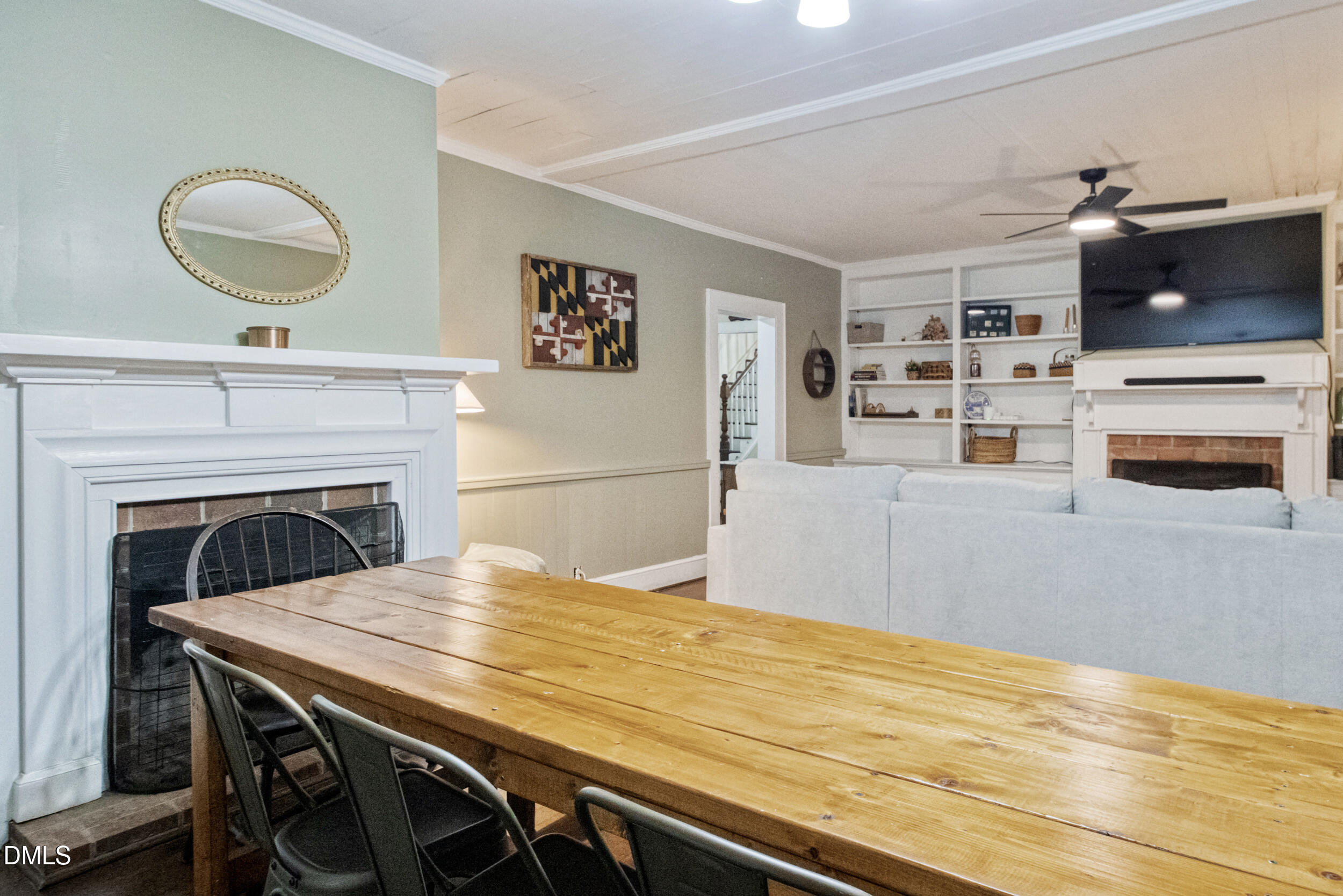 1734 Rocky Ford Road Henderson, NC 27537 - Photo 5 of 44 a bedroom with a bed and a fireplace