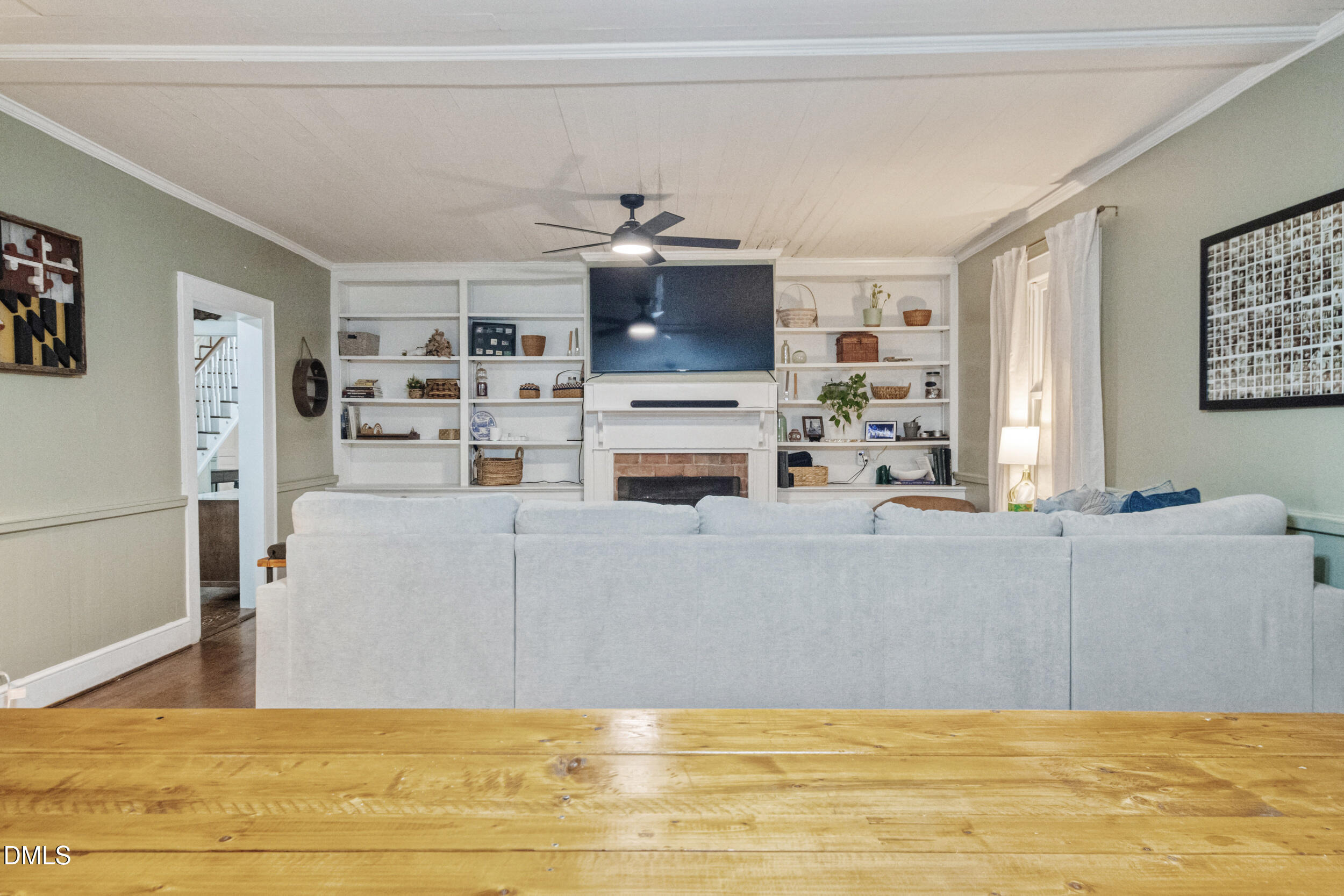 1734 Rocky Ford Road Henderson, NC 27537 - Photo 6 of 44 a living room with furniture and a flat screen tv