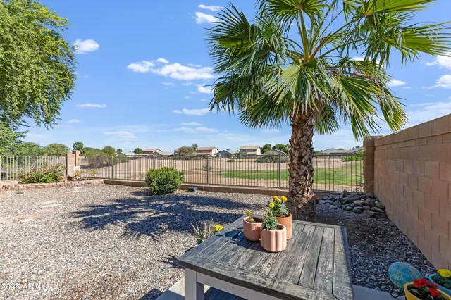a view of a backyard with a patio