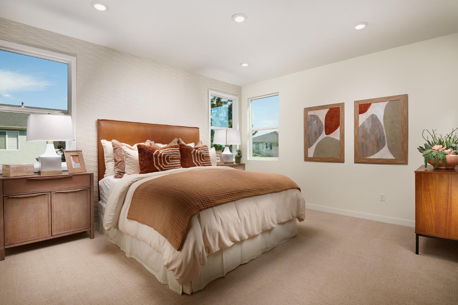 4727 Ariel Street Keyes, CA 95328 - Photo 14 of 22 a bedroom with a bed and painting on the wall