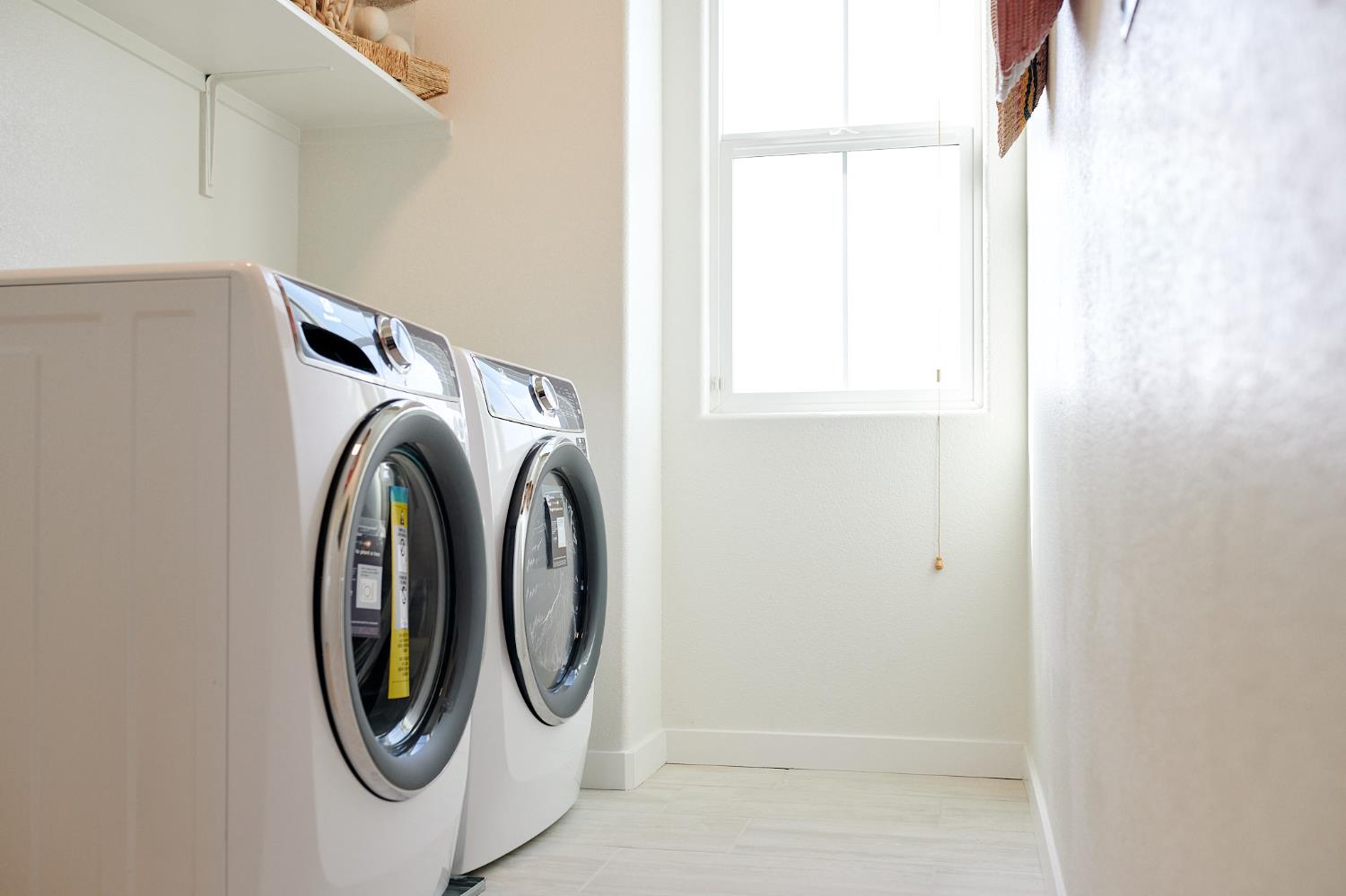 4727 Ariel Street Keyes, CA 95328 - Photo 21 of 22 a utility room with dryer and washer