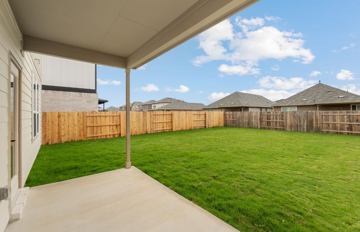 360 Begonia Street Buda, TX 78610 - Photo 23 of 26 a view of a porch with a backyard