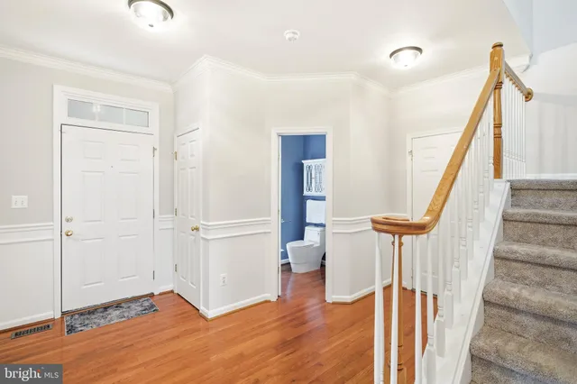 a view of a balcony with wooden floor