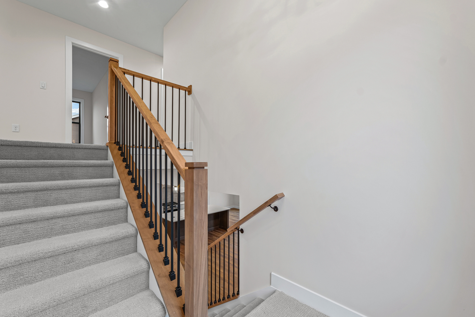 407 Harpers Ferry Savoy, IL 61874 - Photo 15 of 31 a view of staircase with railing and white walls