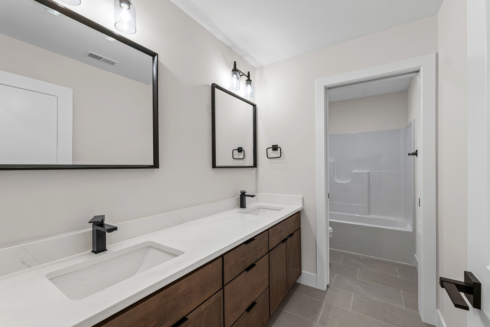 407 Harpers Ferry Savoy, IL 61874 - Photo 20 of 31 a bathroom with a sink and a mirror