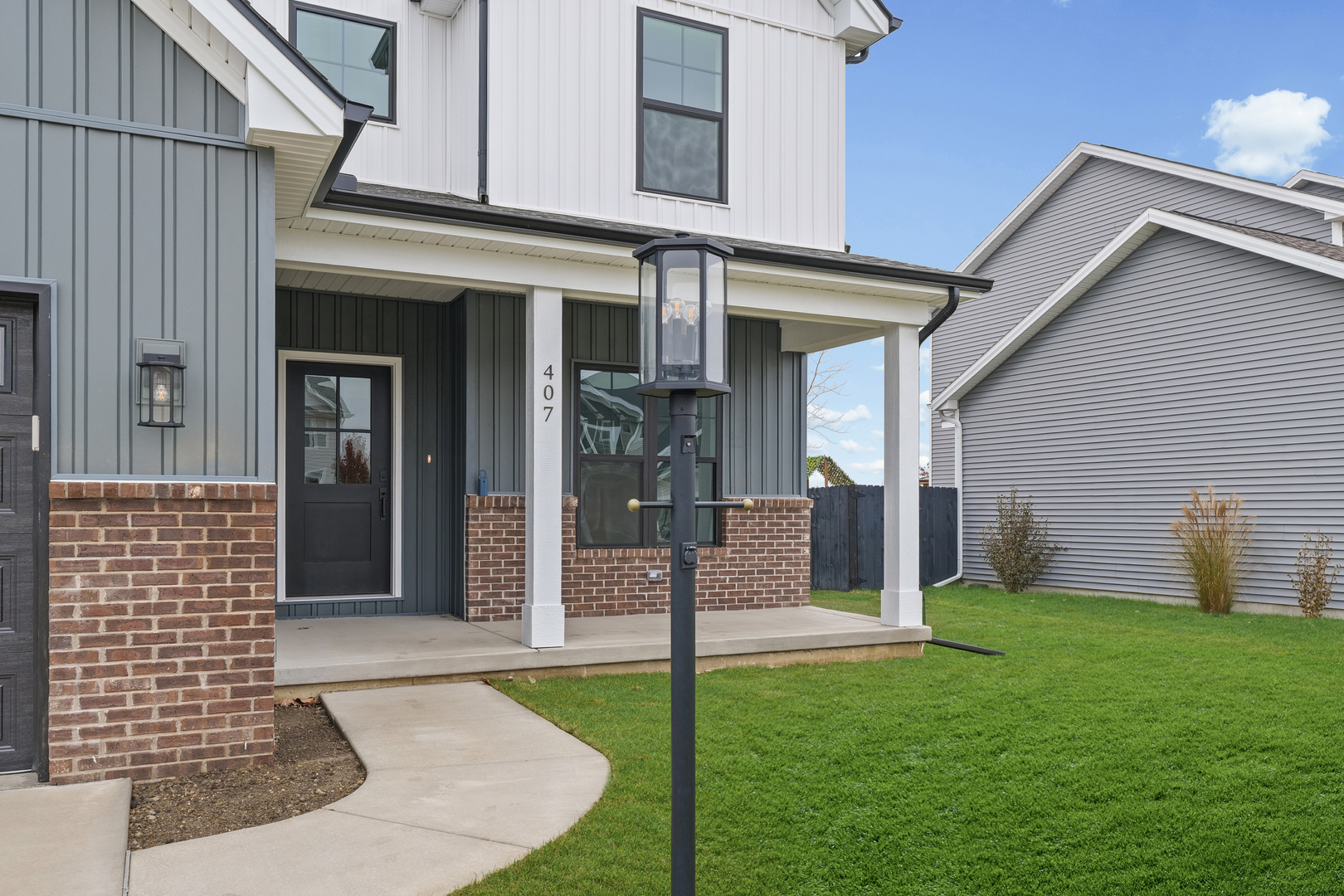 407 Harpers Ferry Savoy, IL 61874 - Photo 3 of 31 front view of a house with a yard