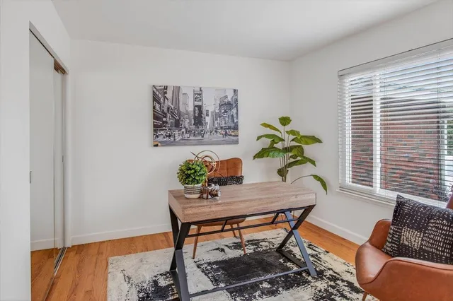 a bathroom with a sink toilet tub and shower