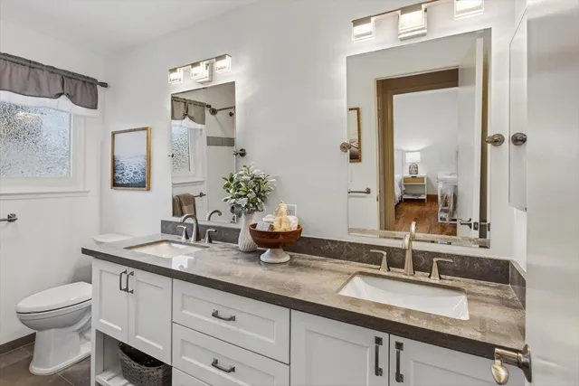 a bathroom with a bathtub and shower
