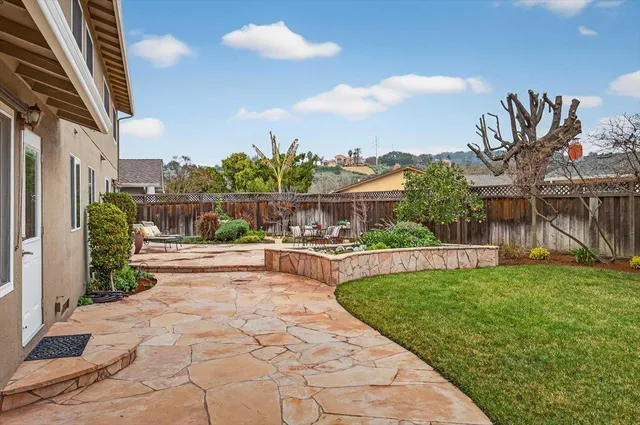 a garden view with a seating space