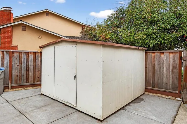 a front view of a house with yard