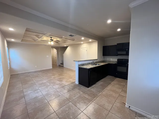 a large kitchen with a cabinets and counter space