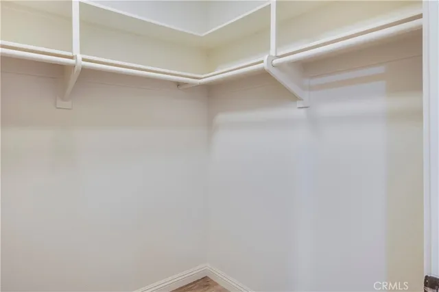 a view of an empty walk in closet