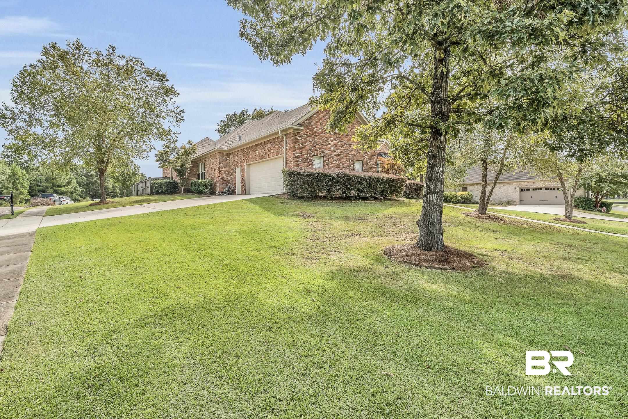 7696 Raegan Lane Daphne, AL 36527 - Photo 39 of 41 View of front of house featuring a front lawn
