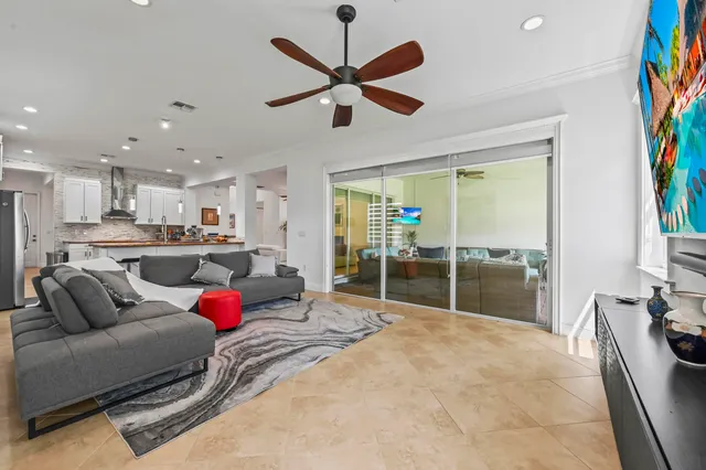 a bed room with a bed and a chair