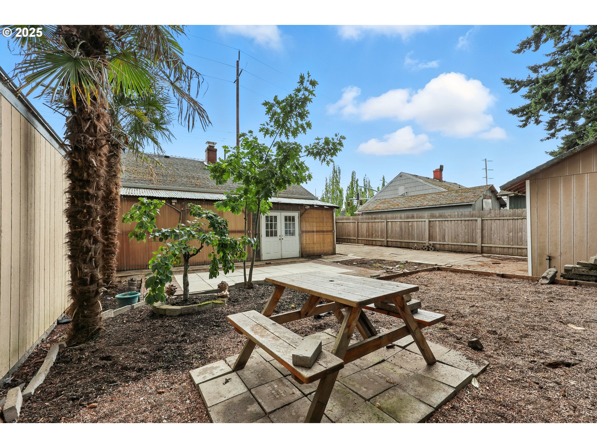 1611 Northeast 102nd Avenue Portland, OR 97220 - Photo 25 of 30 a view of a backyard with furniture and a garden