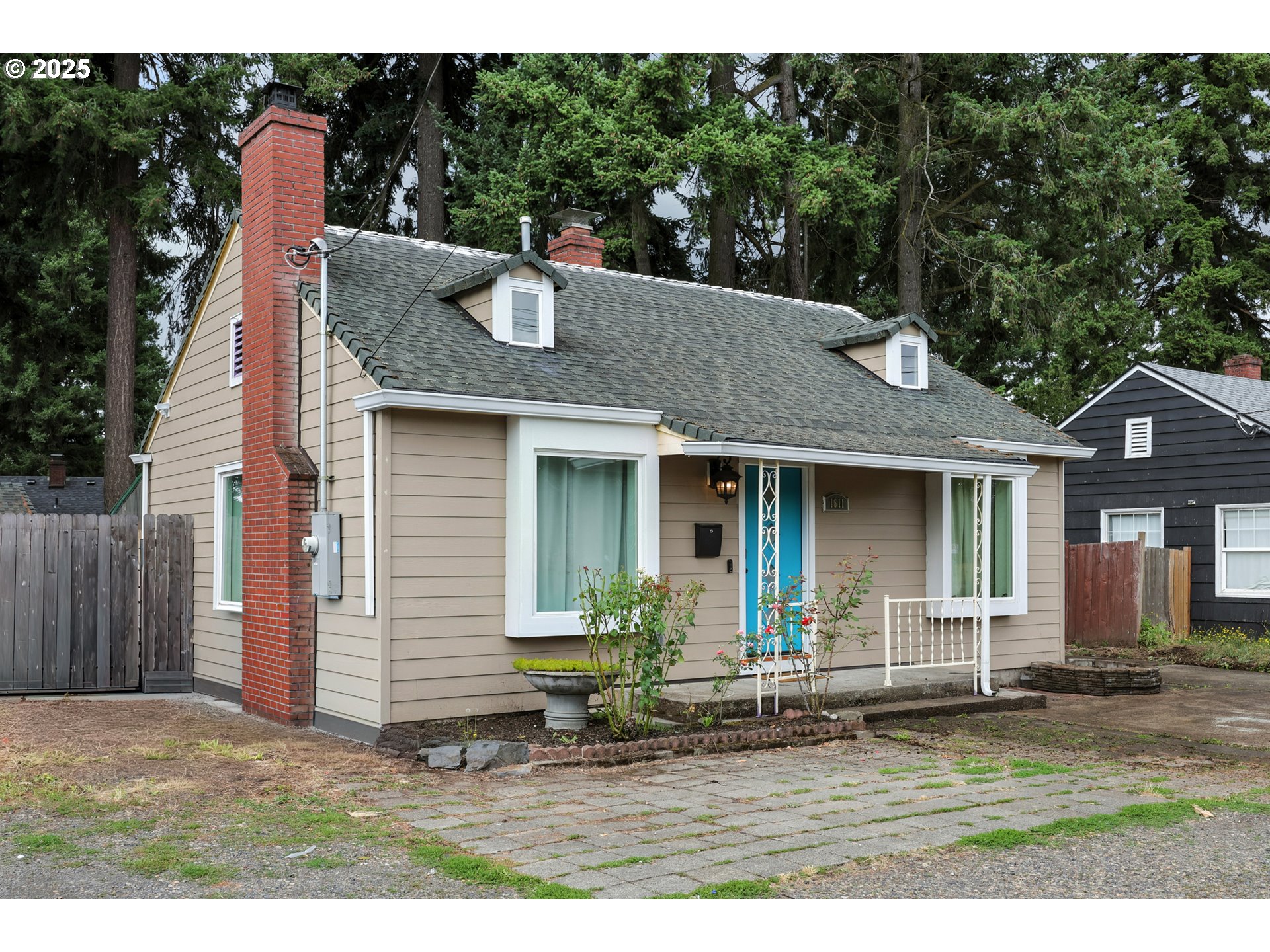 1611 Northeast 102nd Avenue Portland, OR 97220 - Photo 3 of 30 a front view of a house with garden